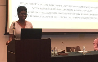 Taylor Roberts presents at a conference
